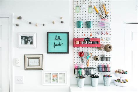 The large doors on the right are a queen wall bed. Organized White Craft Room Ideas