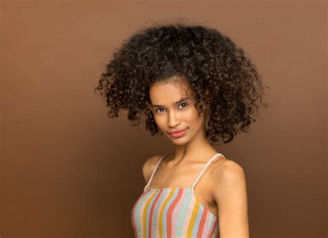 Cutting off your damaged hair to grow natural and healthy hair doesn't have to be traumatic, if you choose one of these totally trendy short afro hairstyles. Curling Afro Haircut / Curly Hairstyles For Black Men How ...