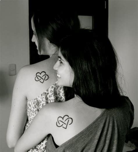 This is a torii, a traditional japanese gate, that symbolizes the transition from the profane to the peace symbol tattoo. sister tattoos. looks like the polyamory infinite love ...