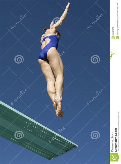 Maybe you would like to learn more about one of these? Female Swimmer Jumping On Diving Board Stock Photo - Image ...