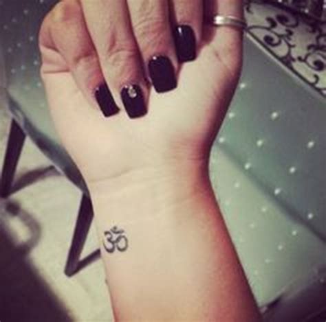 Many of scientist also agree that it has some good power. 46 Om Tattoo On Wrists