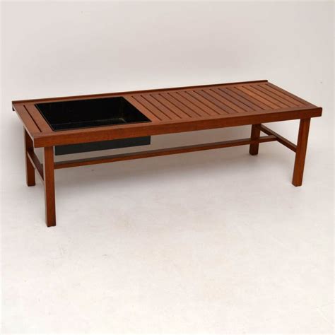 A vintage rectangular teak coffee table. Danish Retro Teak Coffee Table / Bench / Planter Vintage ...