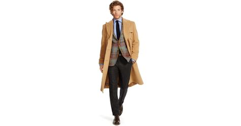 Muted colours add timeless appeal to the farfetch collection, which also features polo ralph lauren's distinctive motif throughout. Polo Ralph Lauren Camel Hair Polo Coat in Natural for Men ...