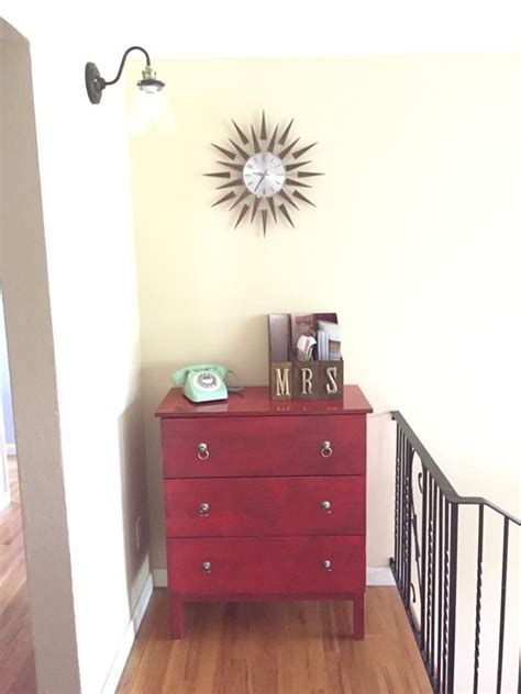 Find balance when arranging furniture. Top of the entryway stairs. Repainted Ikea dresser and storage boxes. | Dresser as nightstand ...