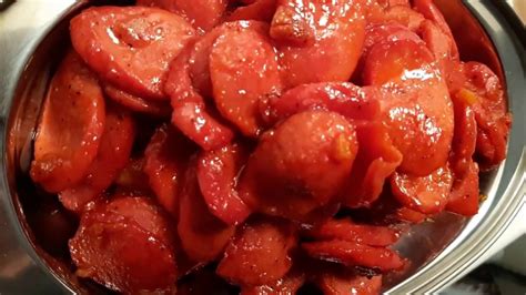 Simmer for 2 to 3 minutes. Sueteed Hotdog in Garlic with Ketchup - YouTube
