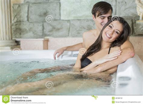 Chasing fireflies is an amazingly romantic studio cabin. Young Couple Relaxing In The Hot Tub Stock Photo - Image of hydrotherapy, pamper: 48188132