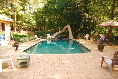 No, peach state inn & suites does not have a pool onsite. Pool design by Peach State Pool Builders. | Small backyard ...