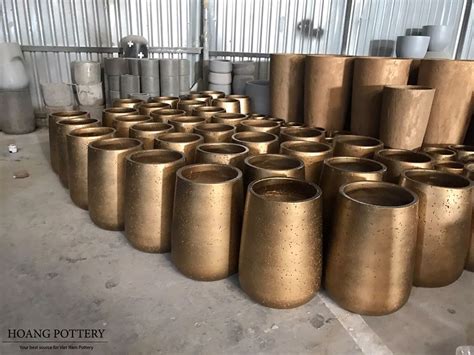 By tim and mary vidra. SO IMPRESSIVE: HOANG POTTERY'S COPPER-GOLD PAINTED CEMENT ...