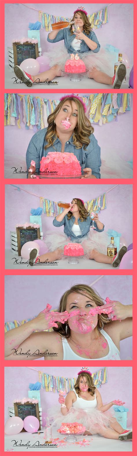 a woman with pink frosting on her face sitting in front of a cake