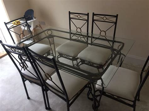 When buying a dining table, you may want think about getting: Wrought Iron Glass Top Dining Table and 6 Chairs | in ...