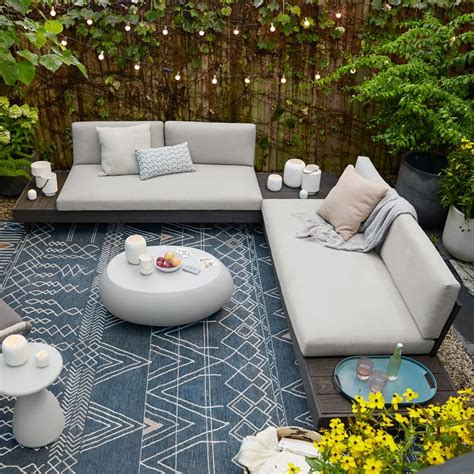 Place a coffee table a little smaller than the middle area of the sectional this will form a classic living room appearance. Portside Outdoor Low 3-Piece L-Shaped Sectional w/ Corner Coffee Table | West Elm