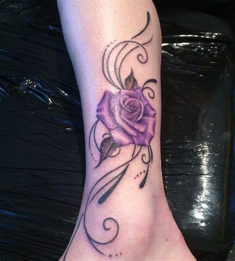 A very tiny small rose tattoo on wrist of girl. Rose on Wrist Tattoo - Satori Body Art Tattoo Artist