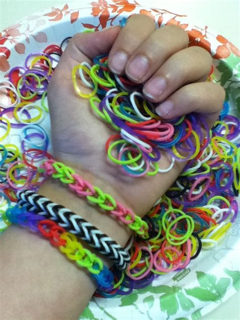 Keep gathering hair until you get all the way down, then clip into place when you are finished. Simple Rubber Band Bracelet : 6 Steps - Instructables