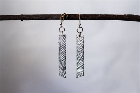 With their bright silver shine, these jewelry bails are sure to complement any pendant you may have in mind. Sterling Silver Abstract Botanical Medium Strip Earrings ...
