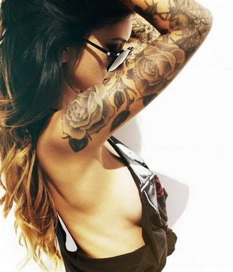 This kind of tattoos play the contrast card very well. 40+ Cool and Pretty Sleeve Tattoo Designs for Women | Styletic