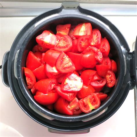 Take frozen tomatoes and place them in a large pot (do not use aluminum as that will react with the acidity of the tomatoes) and bring to a slow boil, then 4. Large Batch Tomato Sauce -Pressure Cook 6 Pounds at Once ...