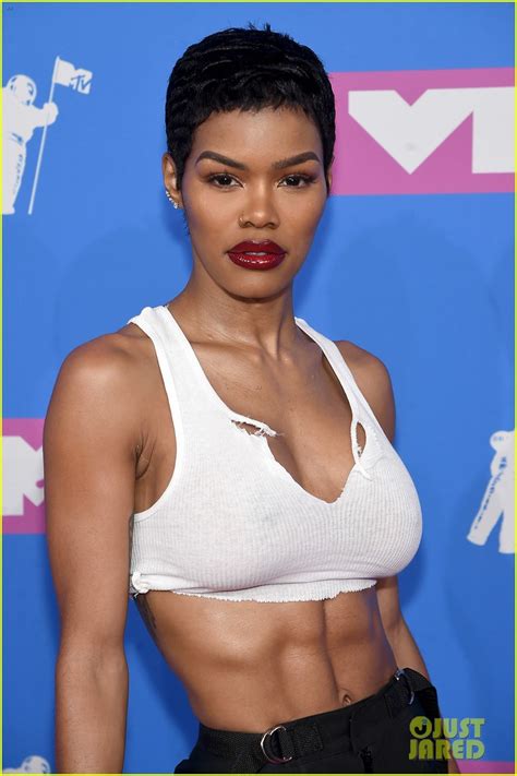 Her pants are tightly fit, clinging on to her legs and thighs. Teyana Taylor Shows Off Her Insane Abs at MTV VMAs 2018 ...