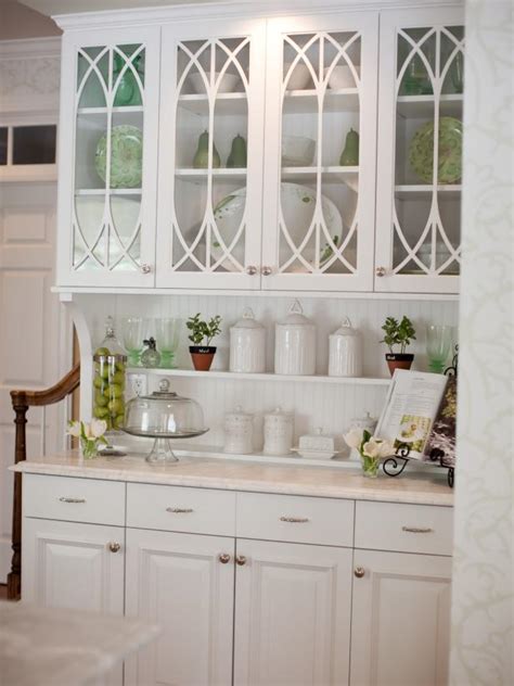 Interior white kitchen buffet with double glass door hutch beautiful and elegant white wooden buffet cabinet with glass doors and several drawers. Built-In White Kitchen Hutch With Glass Cabinet Doors | HGTV