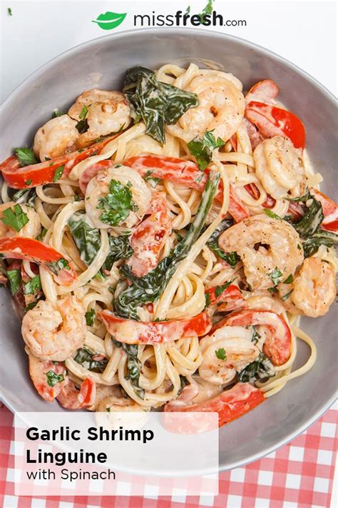 Made with tons of fresh garlic, fresh spinach, and cream in under 20 minutes. Garlic Shrimp Linguine | Recipe in 2020 | Shrimp linguine ...