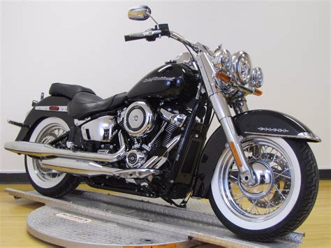 The motorcycle is available in a few different colors: 2019 Harley-Davidson® FLDE Softail® Deluxe (Vivid Black ...