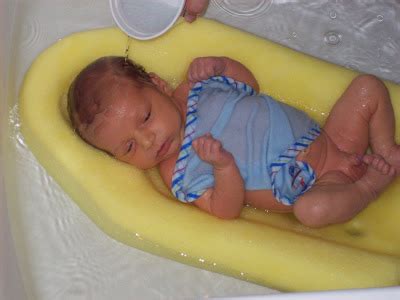 After your baby's circumcision, it is best practice to bathe the baby daily in a warm bath. Bohlen Family: First bath.