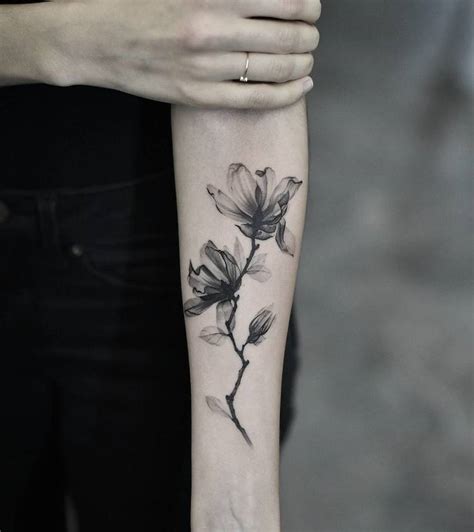 These flowers are large and bold. 40 Exquisite Magnolia Tattoo Designs that Celebrate Beauty and Strength