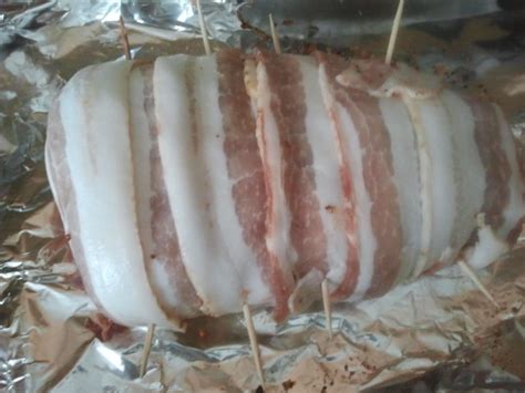 A pork tenderloin is a long thin strip of meat from the loin of the pig. camamamacho in the kitchen: bacon wrapped pork tenderloin