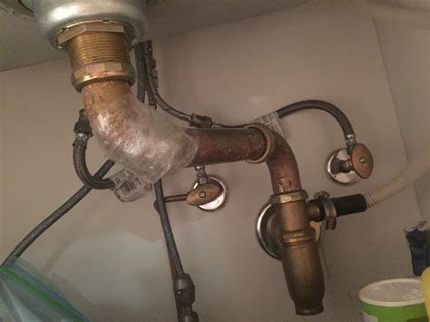 How to unclog a sink drain with plunger. I have a corroded pipe under my kitchen sink and am ...