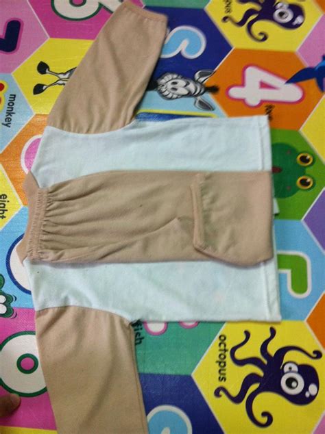 Hanya, soal ukuran, kuyakin setingkat di bawah punyaku yang lebih panjang dan besar. Teknik Lipat Baju Tuck In Elak Baju Baby Bersepah Bila ...