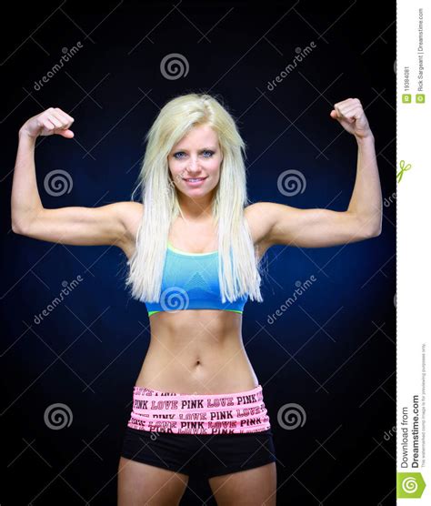 Well, here's what research and the experts have to say on the topic. Woman flexing muscles stock image. Image of background ...