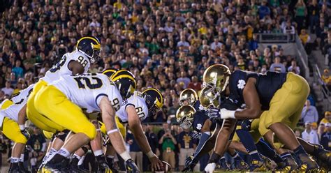 The notre dame football team for at least the last 50 or so years and maybe longer has worn helmets that are similarly painted gold. Recruiting rivalry: Notre Dame gets the best of Michigan