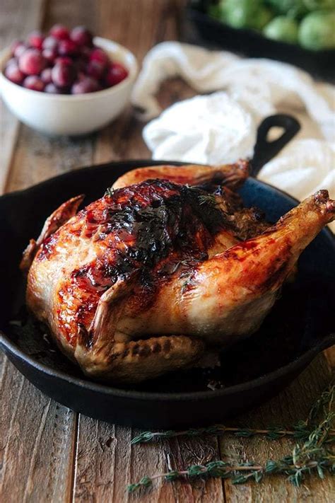 These were great for christmas dinner. Crispy Cornish Game Hens with Cranberry Glaze and Sausage ...