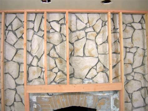 Remove as much dry debris as possible from your fireplace area. How to Build a Standard Wall Over a Stone Wall | how-tos | DIY