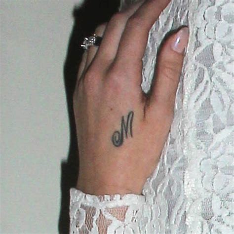 The biggest excuse is that, along taking into a tattoo for the hand makes a completely public confirmation not quite a person's personality and interests. Lana Del Rey Initial Back of Hand Tattoo | Steal Her Style