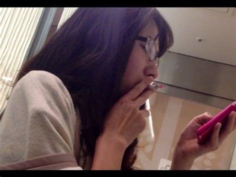 Sad woman lying on a bad and smoking. Pin on Asian Smoke Videos