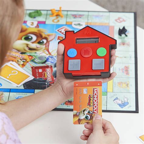 Ahora podrás moverte por el tablero de juego como mario princess peach luigi o toad; MONOPOLY JUNIOR JUEGO DE MESA BANCO ELECTRONICO - Fun in a Box