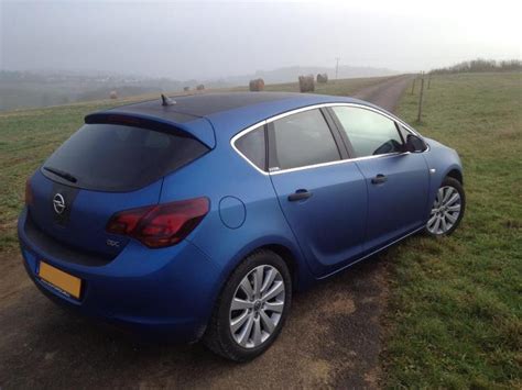 Interior with seats and dashboard anthracite. 1VISION: Opel Astra Blau Metallic Matt