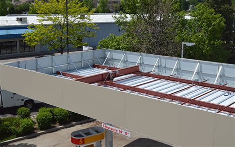 Four white stone pillars are fixed under the ceiling to effectively protect the quality and service life of the ceiling. Gas Station Canopies - Denver - Fort Collins | Assurance ...