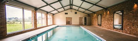 The underground house is given a roof, which is sealed the two men then move on to creating their swimming pool moat. Launceston Farm, Dorset | Luxury self-catering sleeps with indoor pool | Indoor pool, Pool ...