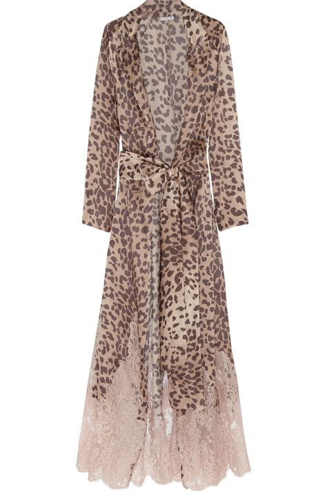 A woven robe featuring an allover leopard print, piped trim, round vented collar, and a removable sash belt. Lyst - Rosamosario Tarzan Loves Jane Leopard-Print Silk ...