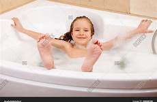 bathtub girl child bathroom stock washes shutterstock
