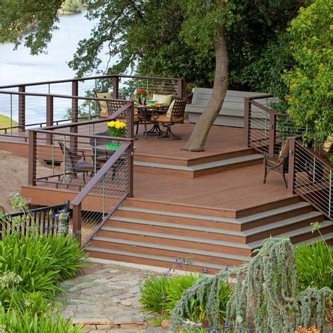 All timbertech decking products are designed to resist moisture damage and can be installed around pools, as docks, and more. TimberTech®️ Tropical Decking, Pacific Walnut with Terrain ...