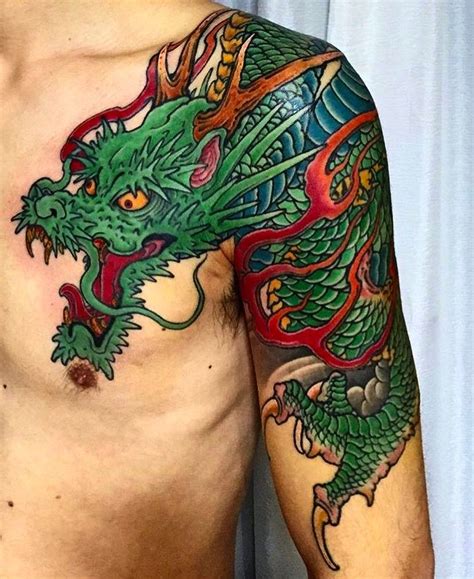 Japanese koi sleeve tattoo started last year as a half sleeve cover up, and lower part just added tis year. Japanese half-sleeve dragon tattoo by @fuji_stateofgrace ...