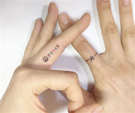 40 Tiny Finger Tattoos That Define Perfection - TattooBlend
