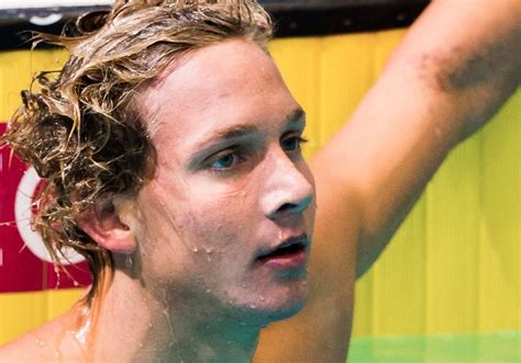 Dressel hopped up on the lane line, flexed his muscles and exhorted the crowd to cheer. Caeleb Dressel, Rising Swim Star Photo Vault