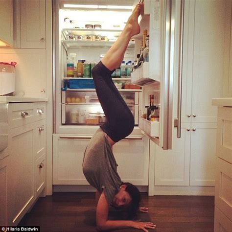 Hilaria Baldwin shows off toned legs in acrobatic yoga ...