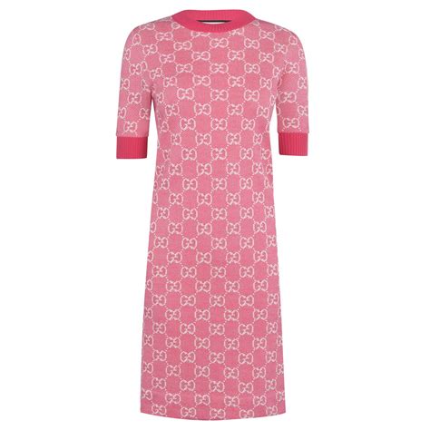 Knitted in a heart motif with flecks of shimmering metallic threads, this romantic piece is finished with a sharp collar and flattering. GUCCI Gg Knit Dress | Flannels