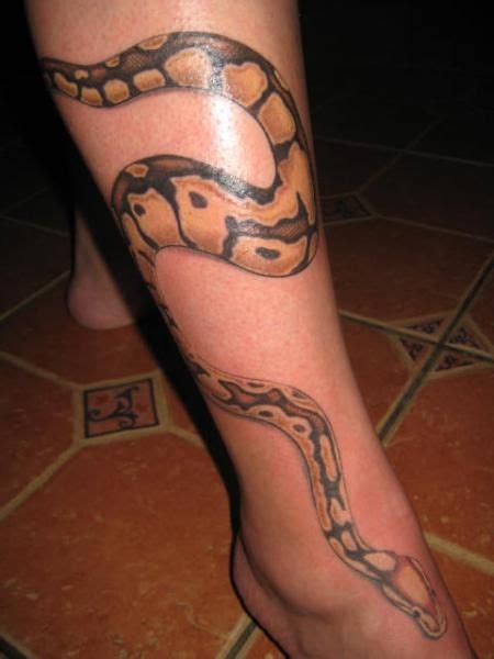 Selecting a snake for a tattoo can be exciting. Ball python wrapped around leg | Leg tattoos, Around arm tattoo, Arm tattoos snake
