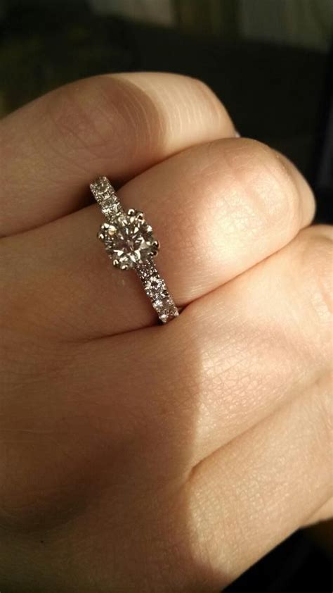 Framed in round diamonds, a marquise leo diamond delivers exceptional brilliance to this breathtaking ring for her. "My customized Leo !!!" - Lauren's beautiful Leo Diamond ...