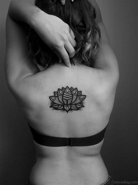 In the past, women's tattoos were defined as chavvy, common and tasteless. 60 Graceful Flowers Tattoos On Upper Back